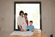 family with house model