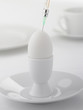 Close up of egg being injected from syringe