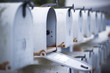 mailbox open in row of mailboxes mailbox open in row of mailboxes
