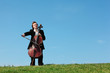 musician plays violoncello against sky musician plays violoncello against sky
