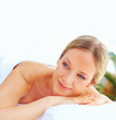 Pretty woman relaxing at a dayspa