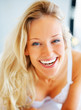 Closeup portrait of a cute young female smiling