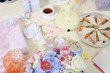 Food and Flowers on a Table at a Baby Shower