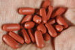 ibuprofen painkillers in palm of hand