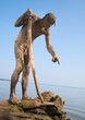 Primeval man catches a fish