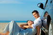 couple beach car travel