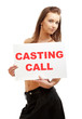 lovely girl holding casting call board