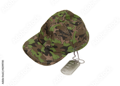 Photo: Dog tags and military cap Dog tags and military cap