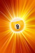 Number nine billiard ball on bright background