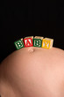 Wooden play blocks spelling the word baby