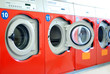 washing machines in a laundromat in a row
