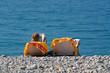 Personen im Liegestuhl am Strand von Nizza Personen im Liegestuhl am Strand von Nizza