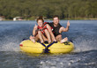 Foto: Fun tubing on a lake Fun tubing on a lake