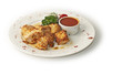 grilled chicken with a sauce and green