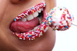 woman mouth with colored candy