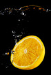 Fresh orange in the water