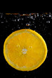 Fresh orange in the water