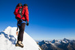 Mountaineer on a snowy ridge Mountaineer on a snowy ridge