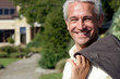 Portrait of handsome mature businessman smiling