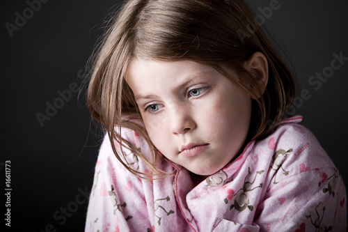 Photo: Shot of Young Child Looking Sad Shot of Young Child Looking Sad