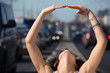 Close up  head of girl thrown back and hand  ring on  highway mi