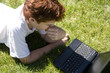 Photo: Boy using laptop Boy using laptop