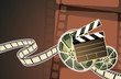 film, clapperboard and a film reel