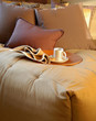 Cosy bedroom interior with breakfast tray on bed Cosy bedroom interior with breakfast tray on bed