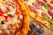 two pizzas close up