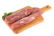 Fresh meat on a wooden board with parsley