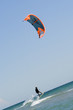 Kiteboarder enjoy surfing in the sea