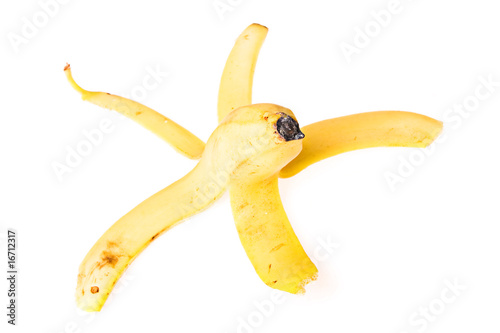 Photo: Peel of banana on white background. Peel of banana on white background.