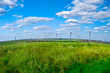 Wind power station - wind turbine against the blue sky Wind power station - wind turbine against the blue sky