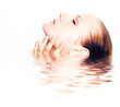Foto: facial massage isolated on white facial massage isolated on white