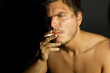 Young Sexy Man Smoking a cigarette Young Sexy Man Smoking a cigarette