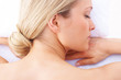 Closeup of a pretty woman relaxing at the spa