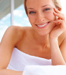 Pretty young woman relaxing at a dayspa