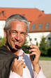 Portrait of mature businessman wearing sunglasses
