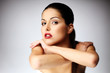Photo: Close-up of beautiful young woman posing. Close-up of beautiful young woman posing.