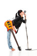 Rock-n-roll girl holding a guitar kissing retro microphone