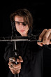 Handsome pirate with eye-patch crossing the guns
