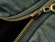 khaki jacket fragment with zipper