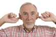 Old man with fingers in his ears