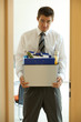Young sad caucassian businessman lost his job