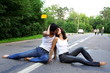 two girs at road