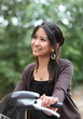 Very pretty young woman on a bicycle