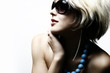 Fashion woman portrait wearing sunglasses on white background Fashion woman portrait wearing sunglasses on white background