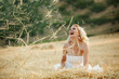 Photo: Bride in hay stack Bride in hay stack
