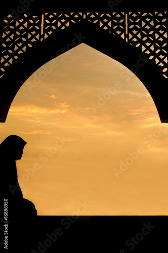 Photo: silhouette of and islamic women during eid-fitr silhouette of and islamic women during eid-fitr