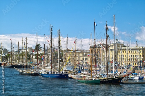 Tallships and yachts in front of antique buildings Tallships and yachts in front of antique buildings